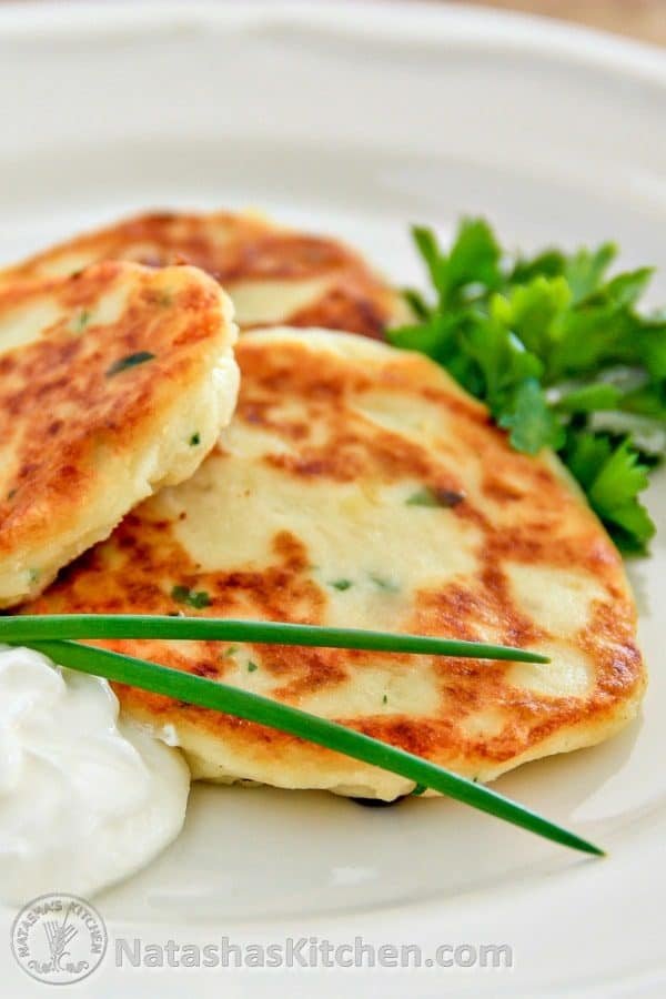 This Easy Mashed Potato Pancakes Recipe works for breakfast, lunch or dinner and it's a perfect use for left over mashed potatoes. Serve with sour cream.