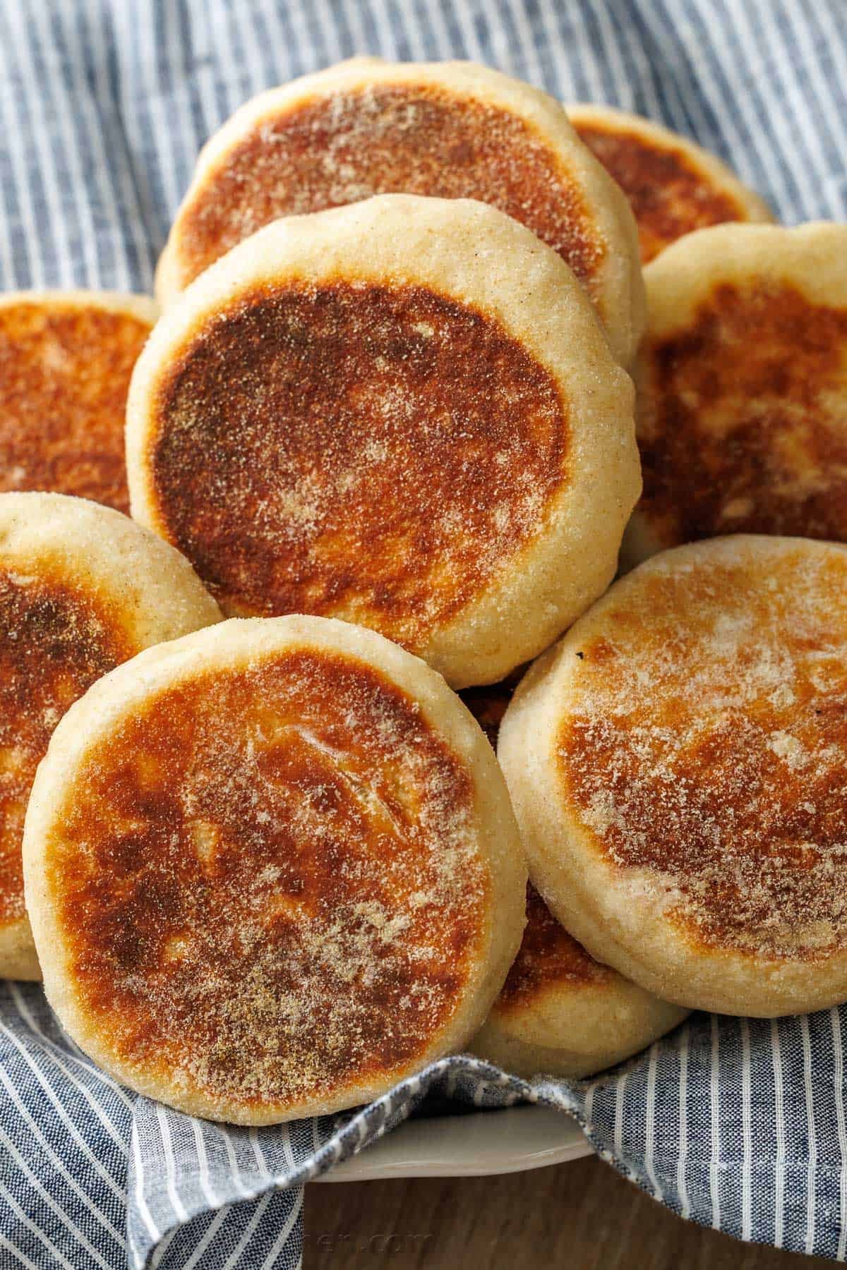 English Muffin recipe dusted with cornmeal in a bowl