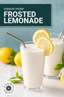 Two glasses of frosted lemonade on a marble countertop. Text overlay includes recipe name.