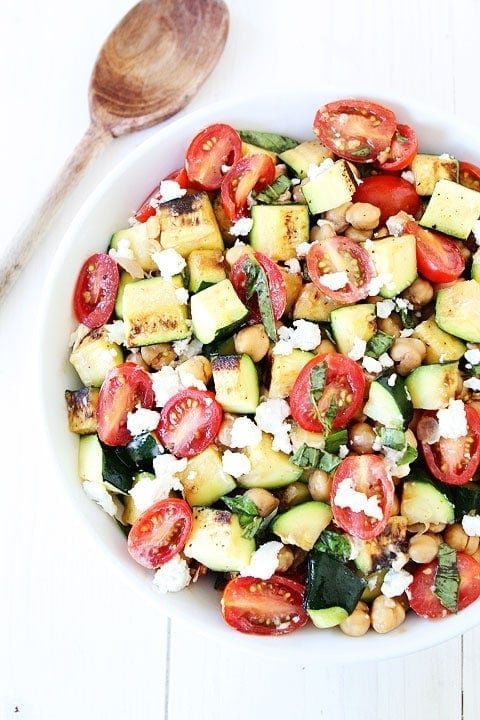 Grilled Zucchini, Chickpea, Tomato, and Goat Cheese Salad Recipe Grilled Zucchini, Chickpea, Tomato, and Goat Cheese Salad Recipe on twopeasandtheirpod.com #salad #zucchini #glutenfree