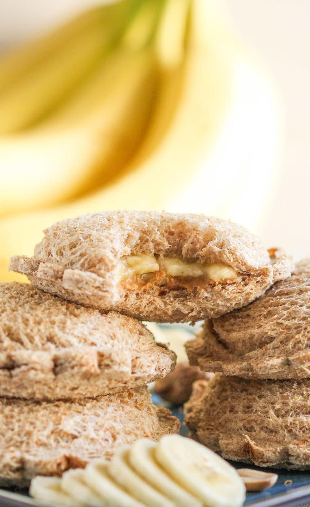 Uncrustables have been made BETTER (and healthier while we're at it)! These Healthy Homemade Peanut Butter Banana Uncrustables are all natural and whole grain with no sugar added. Far better than the original! Healthy Dessert Recipes with low calorie, low fat, high protein, gluten free, and vegan options at the Desserts With Benefits Blog (www.DessertsWithBenefits.com)