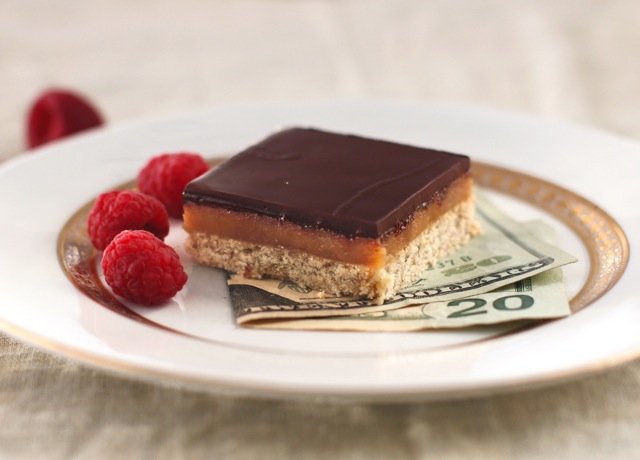 These delicious Healthy Millionaire's Shortbread Bars have a gluten free shortbread base, refined sugar free caramel filling, and dark chocolate topping! You'll feel like royalty with every bite!