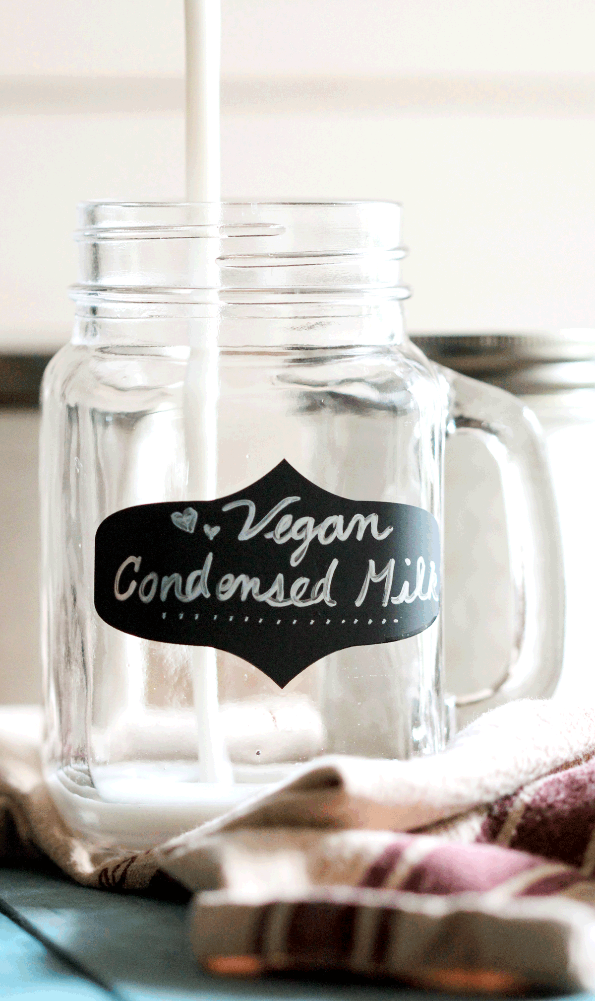 (How to Make DIY Condensed Milk) This super easy 3-ingredient Healthy Homemade Vegan Sweetened Condensed Milk is sweet, thick, rich and creamy, yet sugar free and low carb! Healthy Dessert Recipes with sugar free, low calorie, low fat, low carb, high protein, gluten free, dairy free, vegan, and raw options at the Desserts With Benefits Blog (www.DessertsWithBenefits.com)