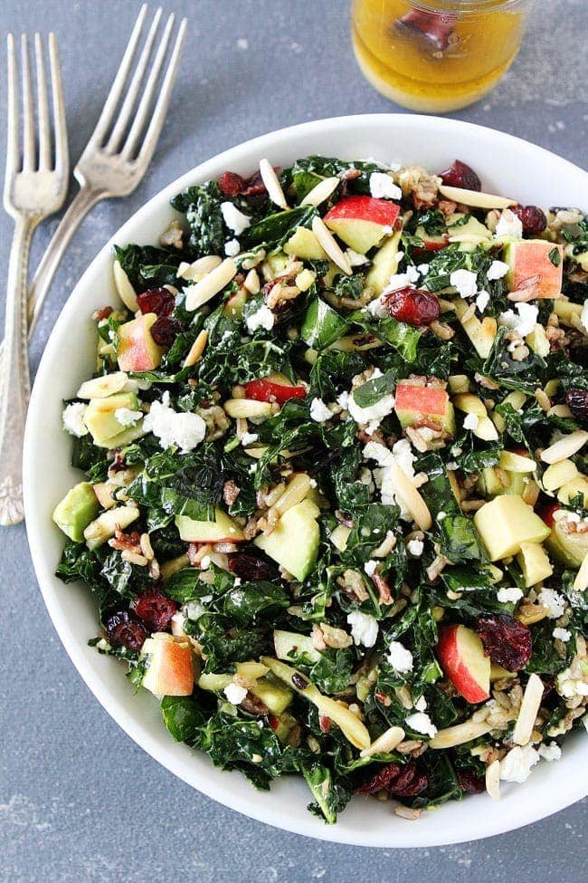 Kale and Wild Rice Salad Recipe on twopeasandtheirpod.com The best kale salad recipe! Everyone begs for the recipe! Kale and Wild Rice Salad Recipe