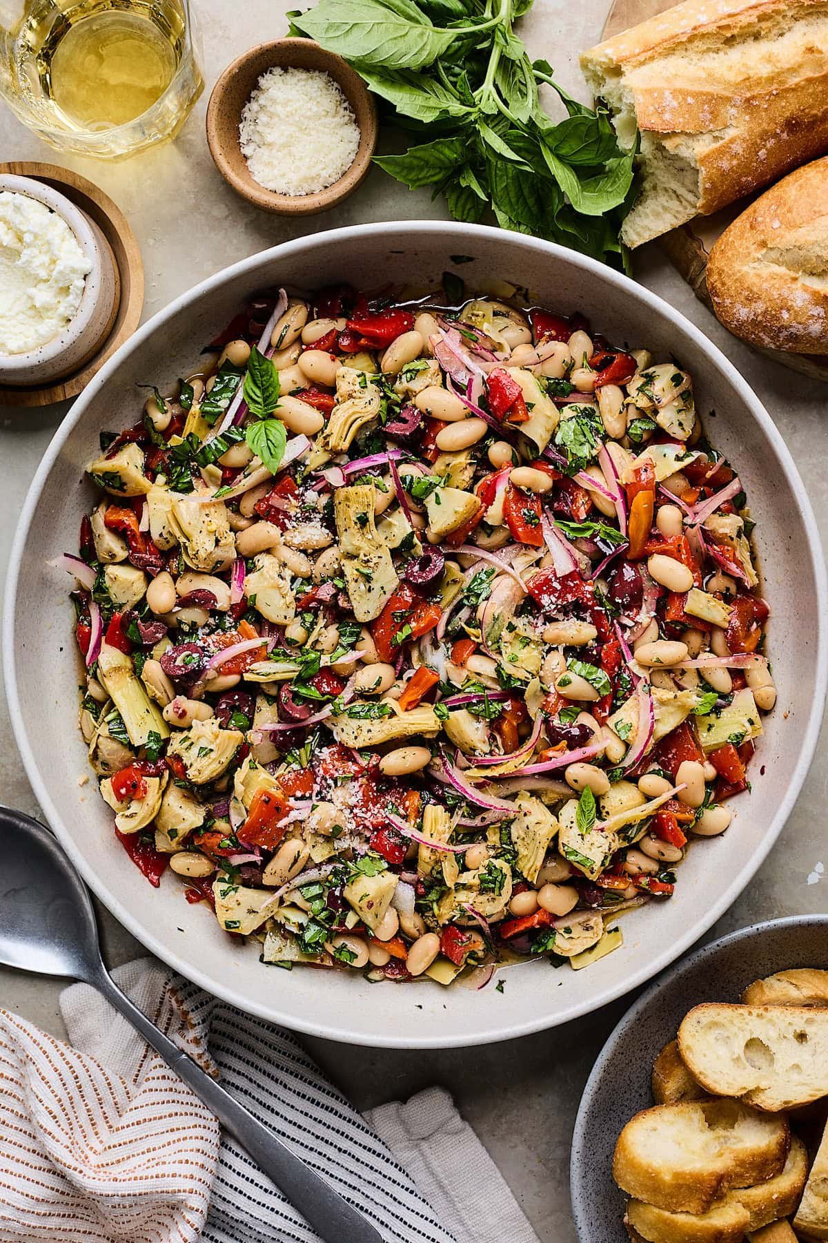 Marinated Artichoke, Roasted Red Pepper & White Bean Salad in bowl.