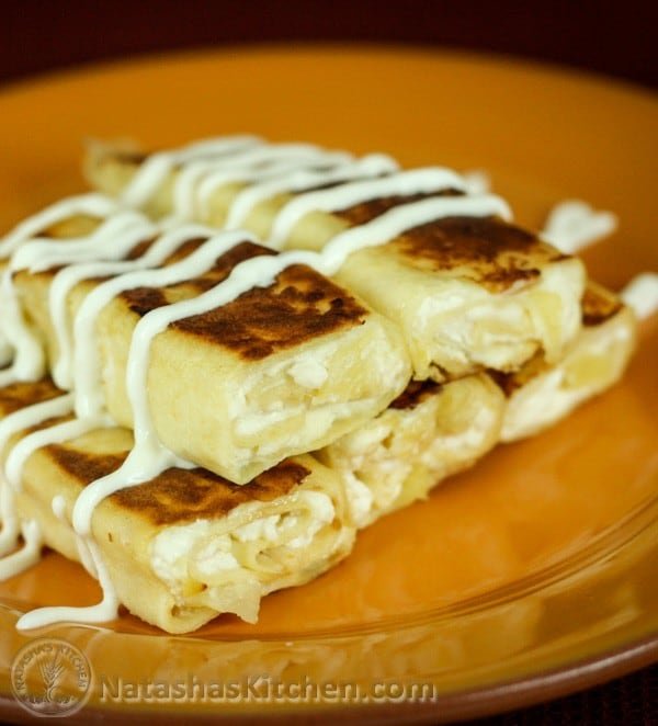 Pineapple here is sweet and tart; a perfect complement to the cheese filling in these nalesniki. Enjoy nalesniki topped with sour cream or favorite jam.