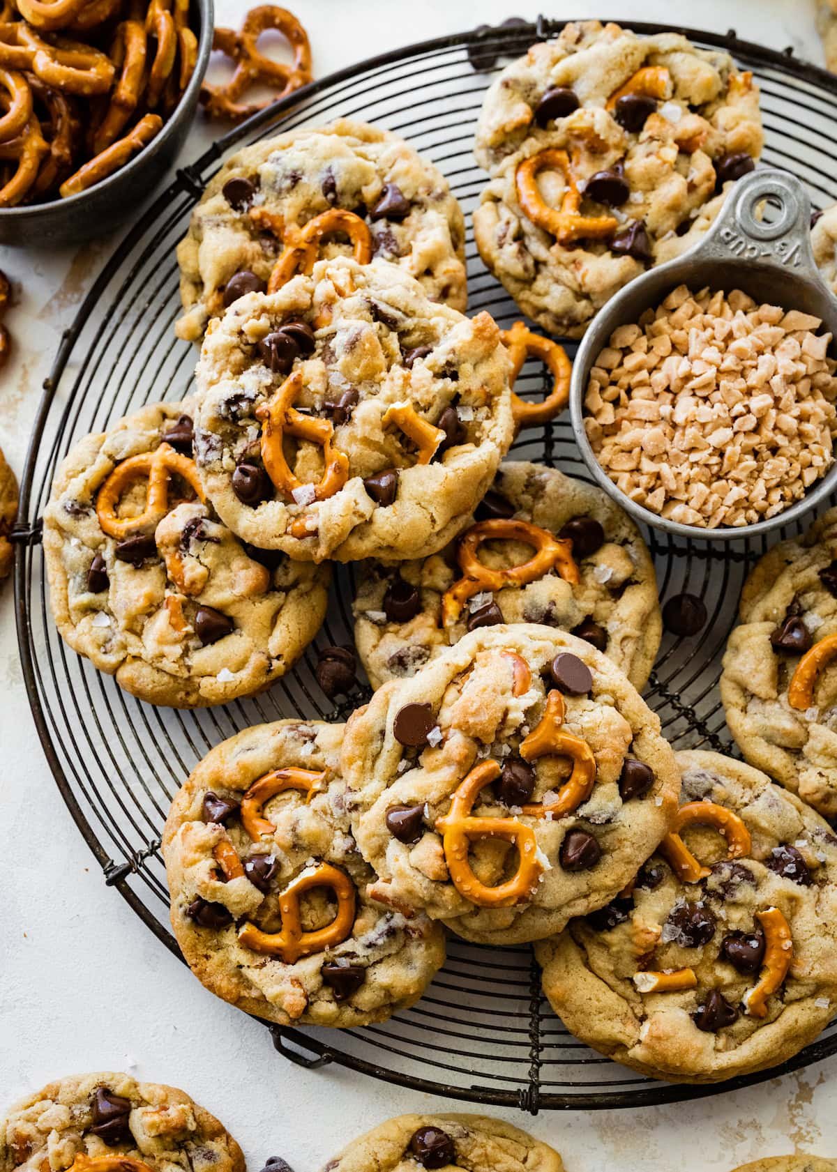 pretzel toffee chocolate chip cookies on cooling rack.