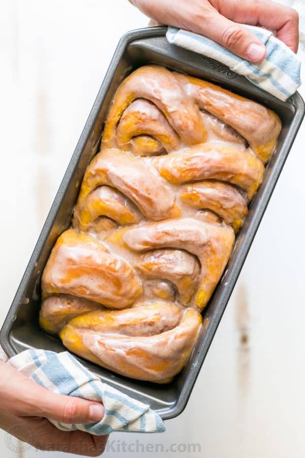 You'll make this Pumpkin Bread over and over. Cinnamon rolls + pumpkin pie + amazing cinnamon glaze = this pull-apart pumpkin bread! It melts in your mouth! | natashaskitchen.com