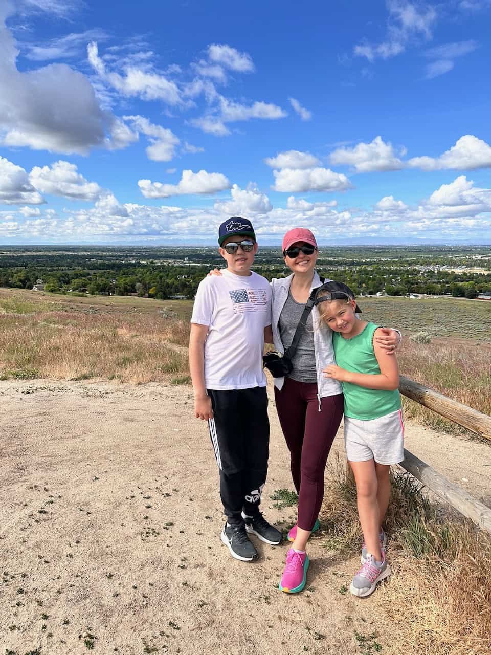 Natasha hiking with family in summer