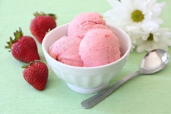 Strawberry Sour Cream Ice Cream Recipe on twopeasandtheirpod.com The BEST strawberry ice cream and it's easy to make too! Strawberry Sour Cream Ice Cream in a bowl