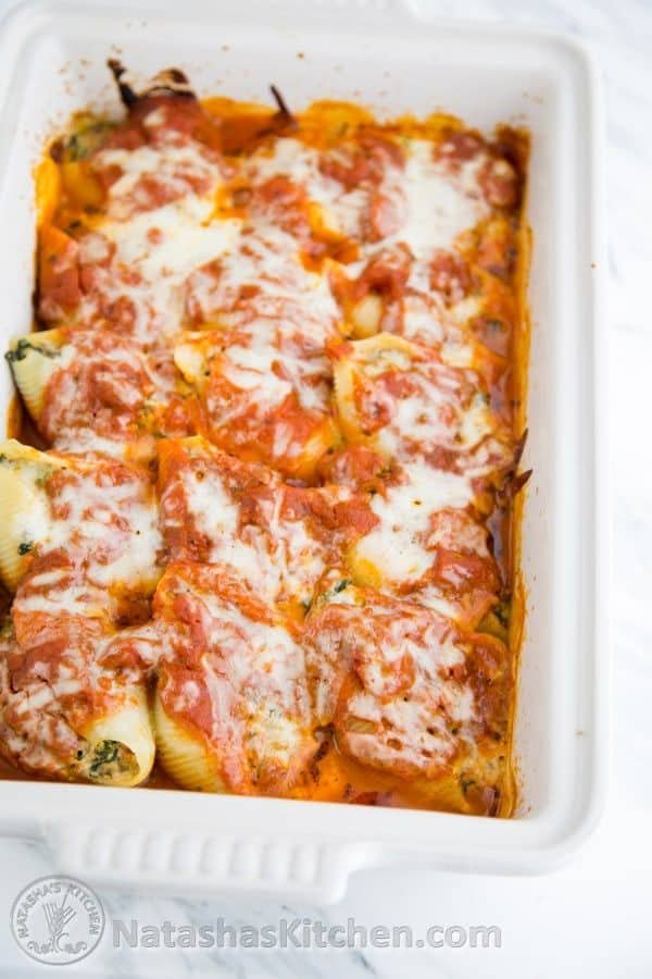 These lasagna stuffed shells are easier than making lasagna but are just as satisfying! @natashaskitchen