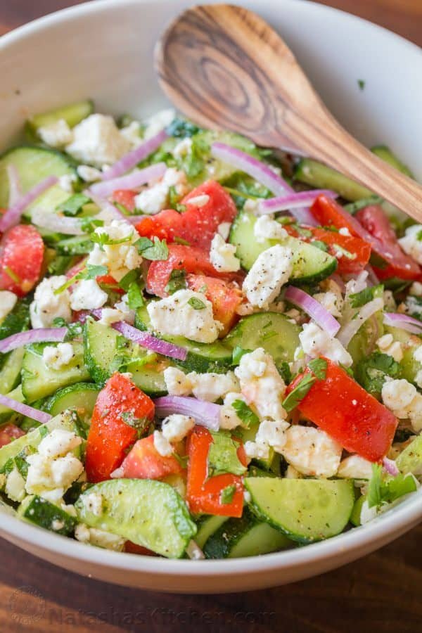 This Cucumber Tomato Feta Salad has simple ingredients that are a winning combination. Refreshing and flavorful! A new favorite cucumber tomato feta salad! | natashaskitchen.com