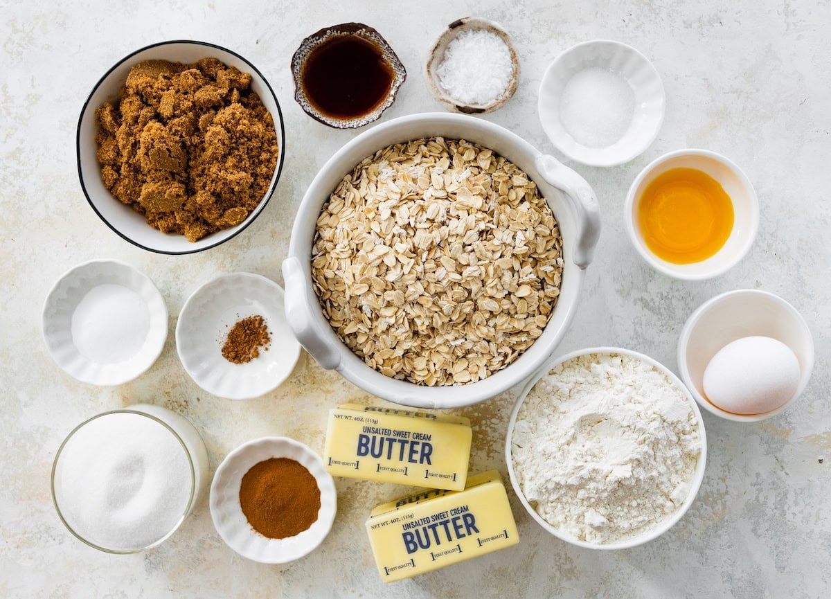 ingredients in bowls to make oatmeal cookies.