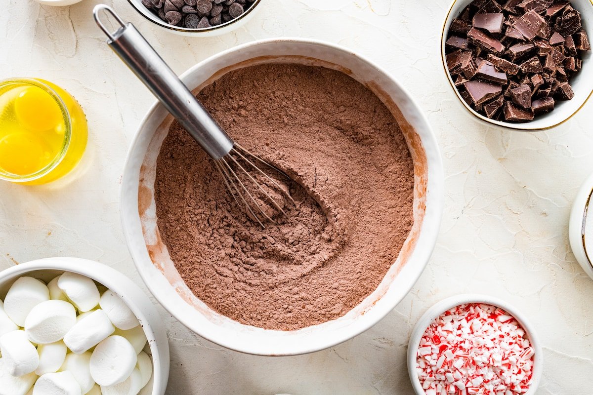dry ingredients and cocoa powder whisked together in mixing bowl with whisk.