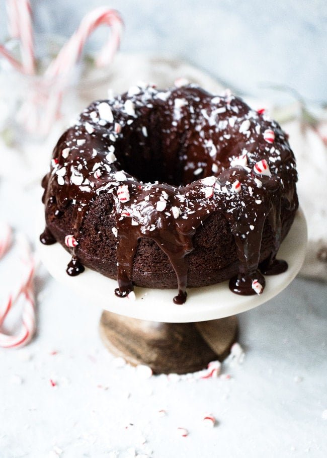 Chocolate Peppermint Bundt Cake with chocolate glaze and peppermint candies. 
