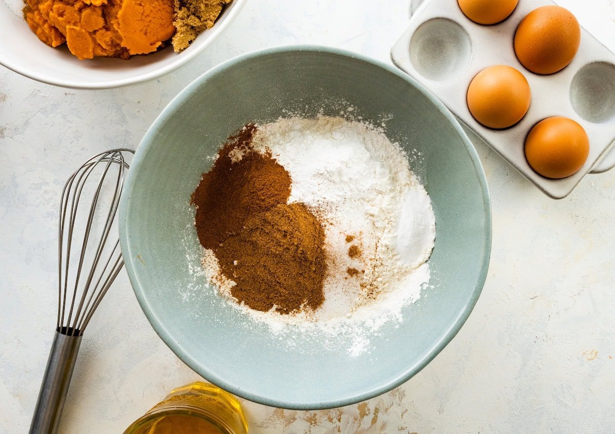 dry ingredients in bowl to make pumpkin cinnamon swirl cake. 