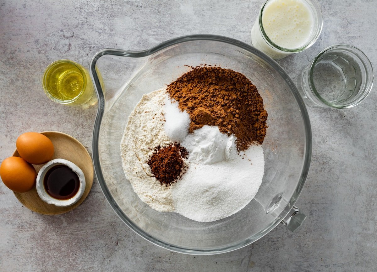 dry ingredients in glass mixing bowl to make chocolate cake. 