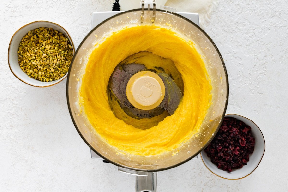 butter, sugar, orange zest, and orange extract in food processor to make shortbread. 