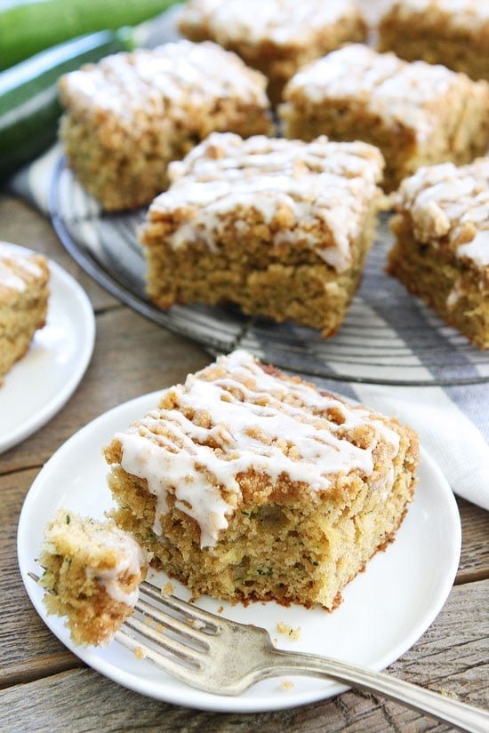 Brown Butter Zucchini Coffee Cake Recipe on twopeasandtheirpod.com Trying to use up your summer zucchini? You HAVE to make this cake. It is easy to make and everyone loves it! Brown Butter Zucchini Coffee Cake with streusel and glaze