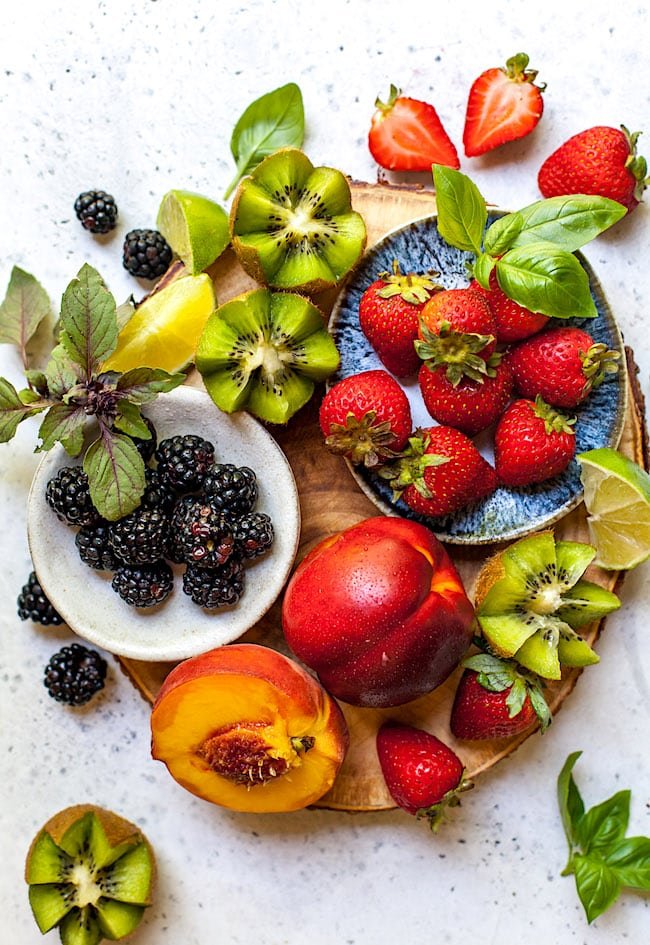 Fresh fruit on platter to make fruit salsa.