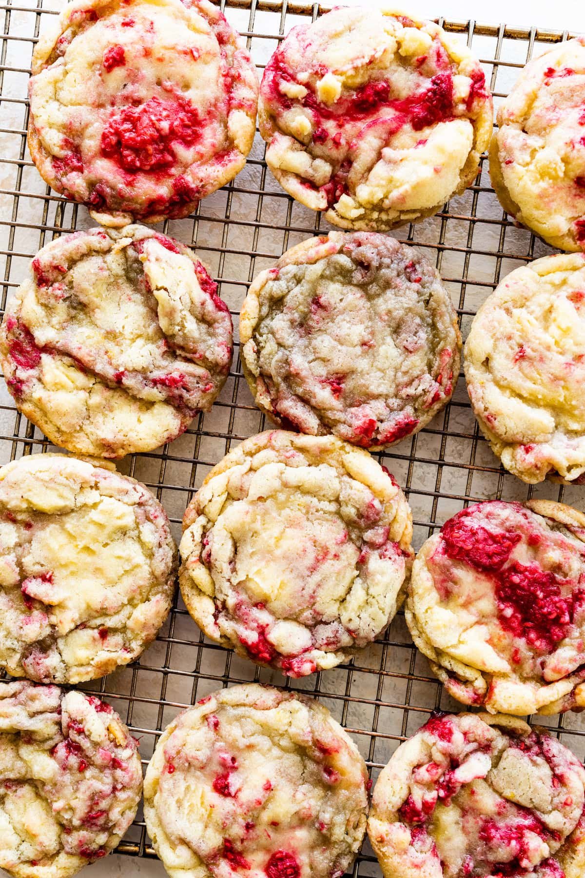 lemon raspberry cookies on cooling rack.