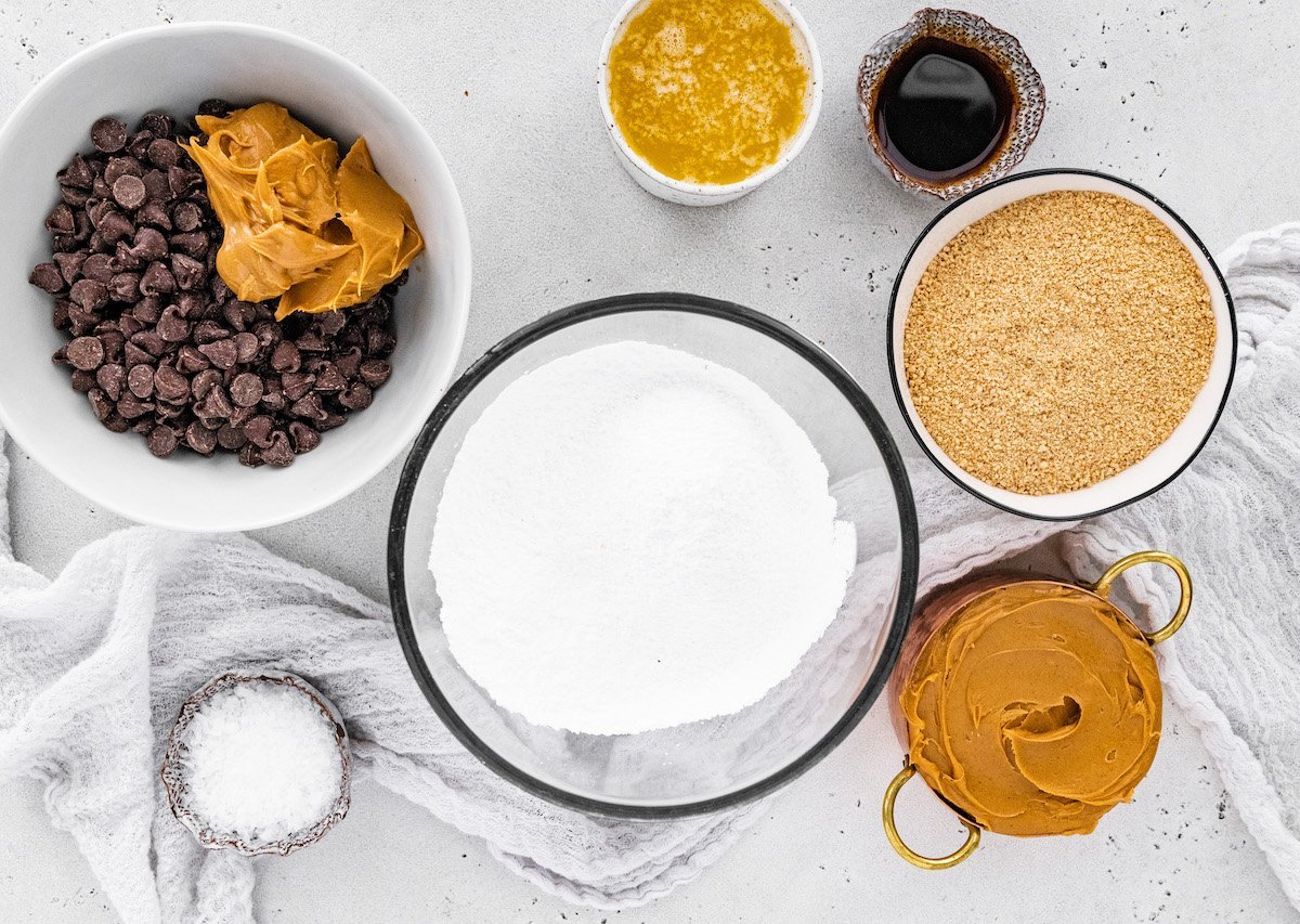 no bake peanut butter bar ingredients in bowls.