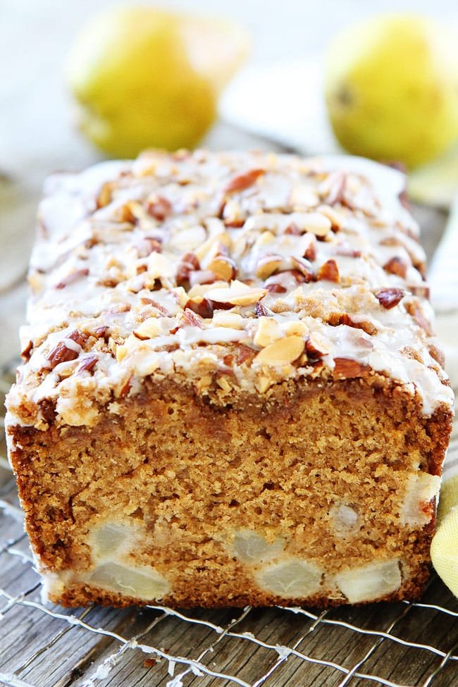 Pear Almond Streusel Bread Recipe on twopeasandtheirpod.com This easy pear quick bread has a sweet almond streusel topping and glaze. Make a loaf today! Pear bread with almond streusel topping