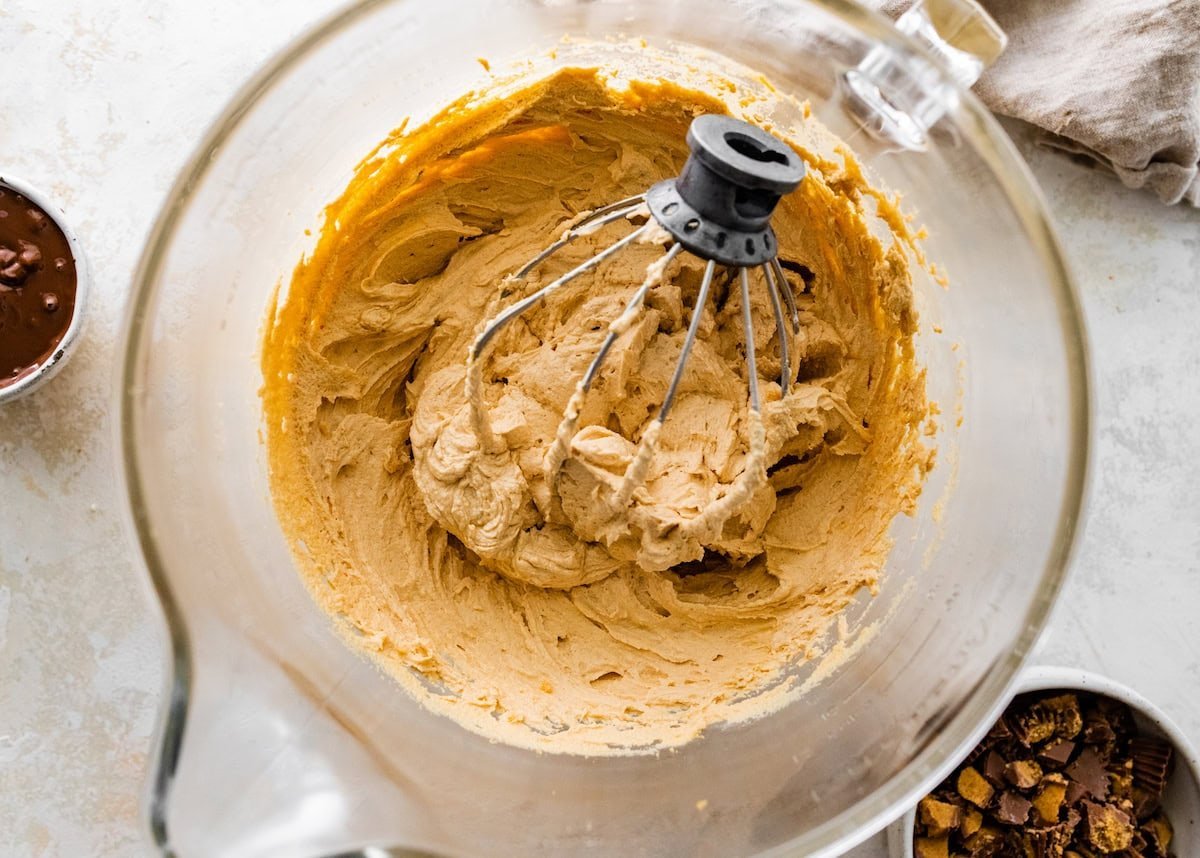 peanut butter filling in mixing bowl with whisk attachment.
