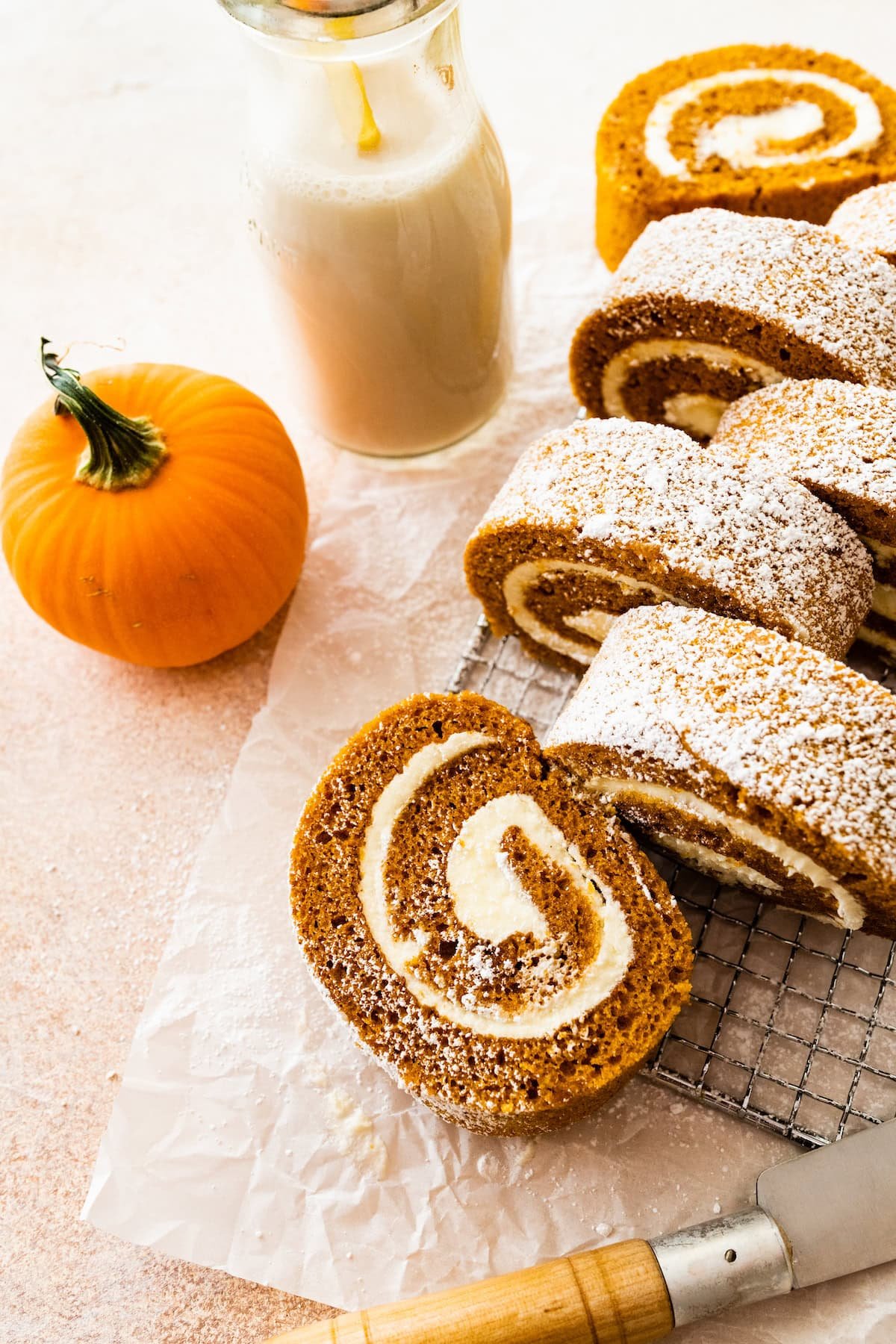 pumpkin roll on cooking rack.