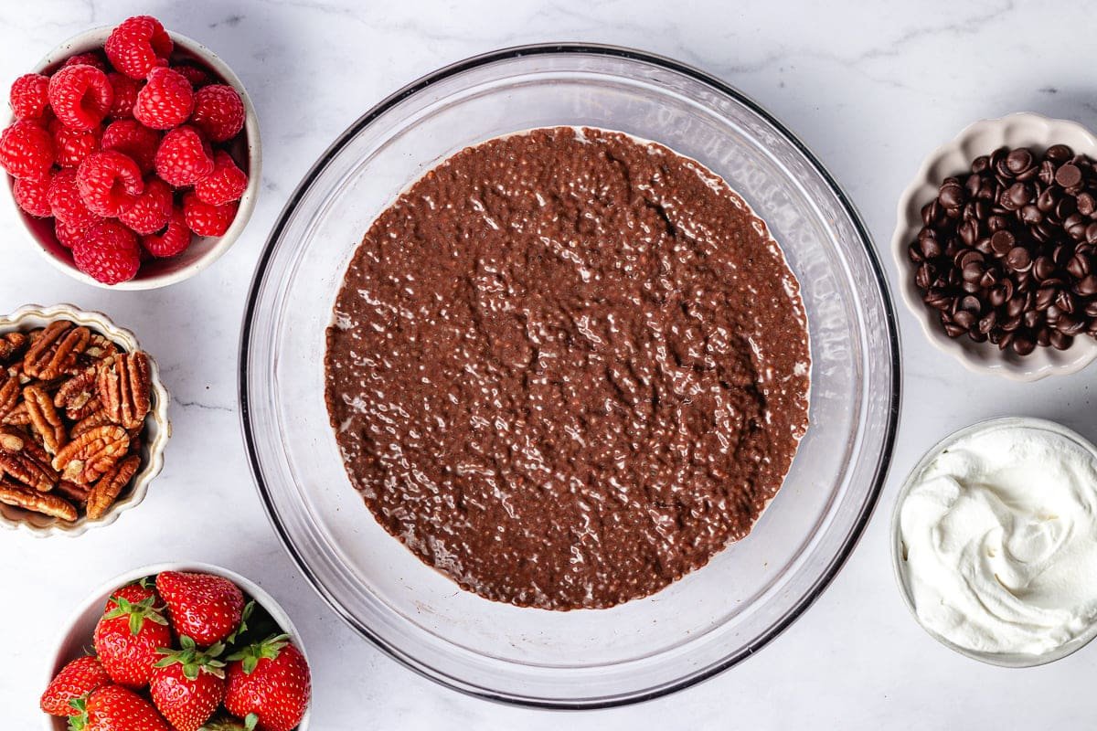 chocolate chia pudding in large glass mixing bowl.