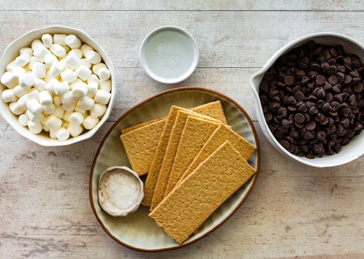 mini marshmallows, coconut oil, chocolate chips, graham crackers, and sea salt to make s'mores clusters.