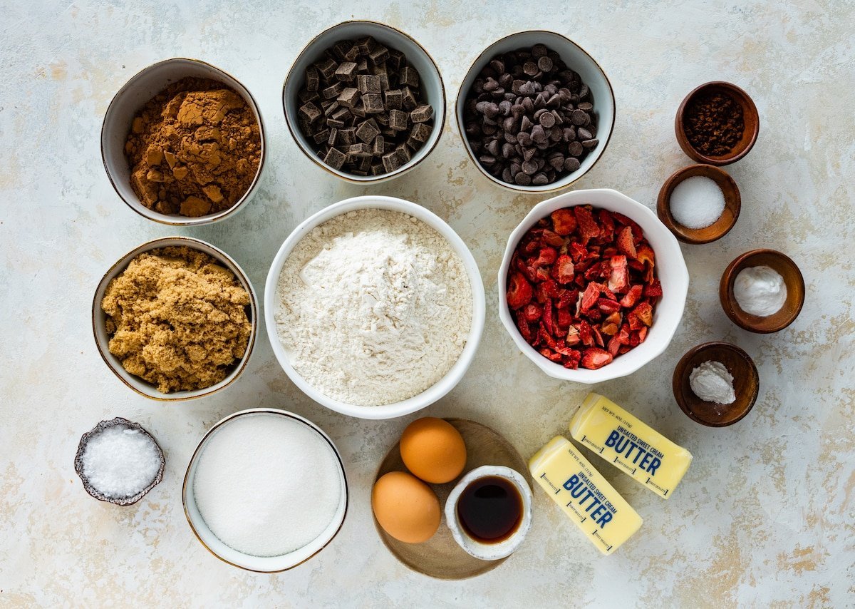 ingredients in bowls to make strawberry chocolate cookies.