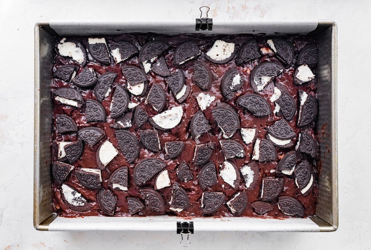 oreo brownie batter in baking pan.