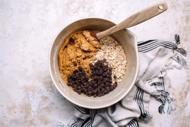 oatmeal chocolate chip cookie bar ingredients in bowl