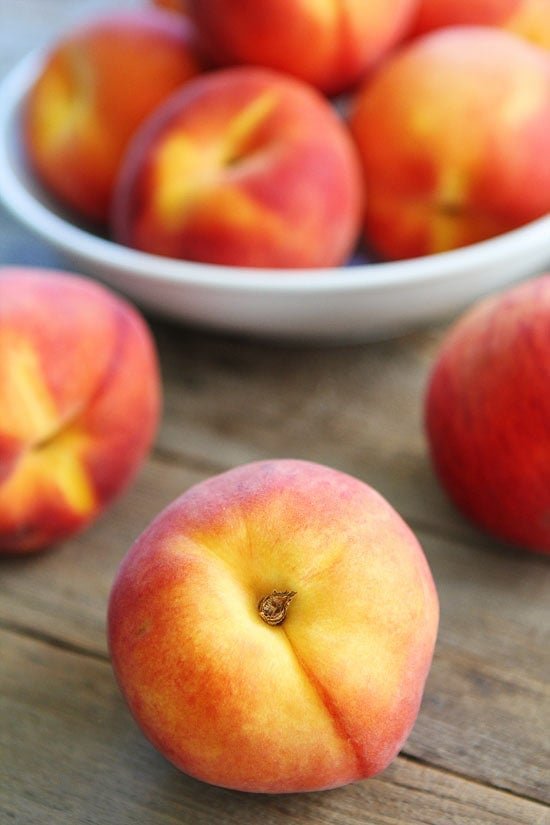Peach Almond Crisp Recipe on twopeasandtheirpod.com Peaches for Peach Crisp Recipe