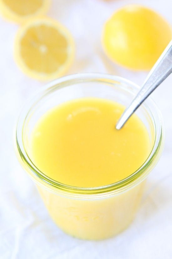 Lemon Curd Recipe on twopeasandtheirpod.com This is the BEST lemon curd recipe and it's easy to make too! Easy Lemon Curd Recipe - stored in glass jar