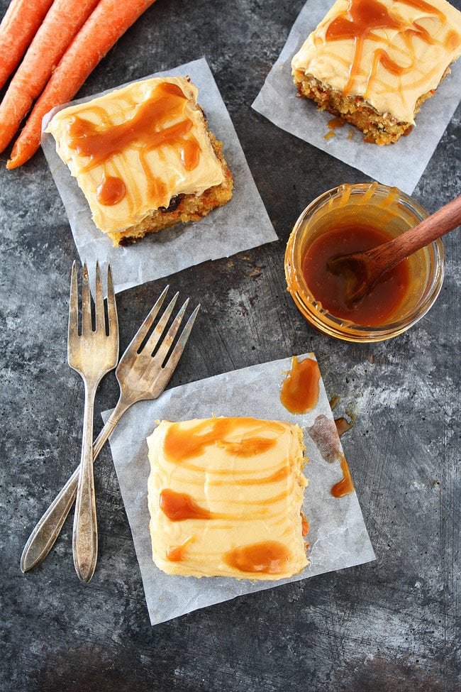 Easy Carrot Cake with Caramel Cream Cheese Frosting Recipe on twopeasandtheirpod.com This moist carrot cake is packed with carrots, pineapple, cinnamon, raisins and topped with a thick layer of caramel cream cheese frosting. It is SO easy to make and SO good! Easy Carrot Cake with Caramel Cream Cheese Frosting Recipe