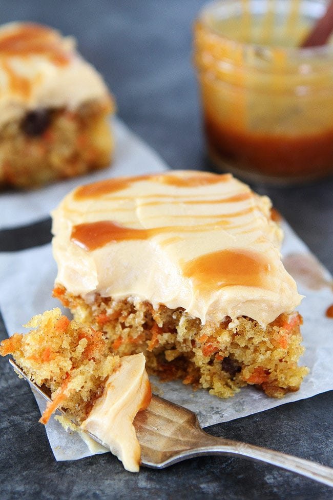 Easy Carrot Cake with Caramel Cream Cheese Frosting Recipe on twopeasandtheirpod.com This carrot cake is SO easy to make and the caramel cream cheese frosting is divine! Make it for Easter dessert! Easy Carrot Cake with Caramel Cream Cheese Frosting Recipe