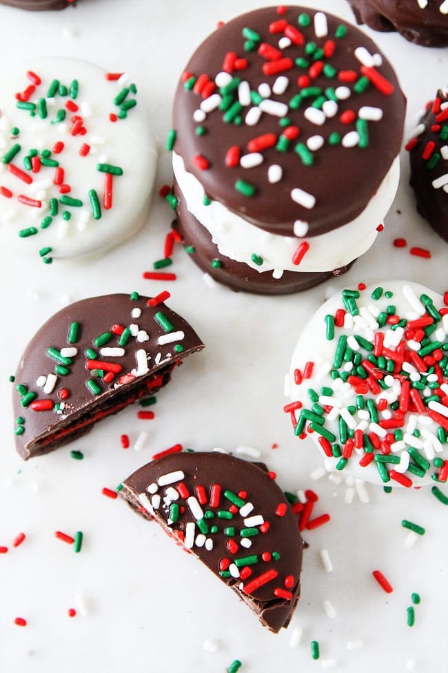 Chocolate Dipped Oreos Recipe on twopeasandtheirpod.com Oreo cookies dipped and chocolate and decorated with fun toppings! These cookies are easy to make at home and make a great holiday gift! Chocolate Dipped Oreos Recipe