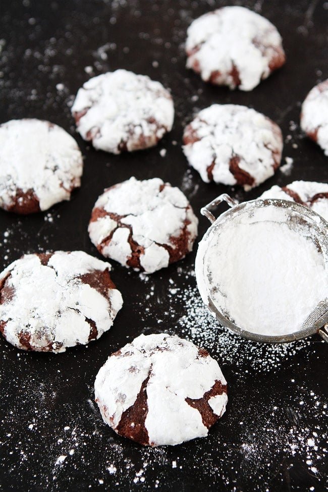 Snowy-Topped Brownie Drops Recipe on twopeasandtheirpod.com Soft, fudgy brownie cookies rolled in confectioners' sugar to create a beautiful snowy top. These cookies are a holiday favorite! Snowy-Topped Brownie Drops Recipe