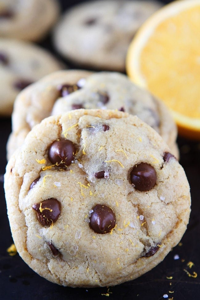 Orange Chocolate Chip Cookies Recipe on twopeasandtheirpod.com Soft and chewy chocolate chip cookies with a hint of orange! The chocolate and orange combo is AMAZING! Orange Chocolate Chip Cookies Recipe on twopeasandtheirpod.com Soft and chewy chocolate chip cookies with a hint of orange! The chocolate and orange combo is AMAZING!