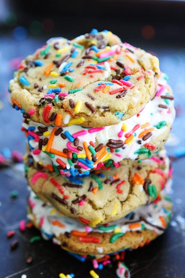 Sprinkle Chocolate Chip Cookie Ice Cream Sandwiches Recipe on twopeasandtheirpod.com Ice cream is sandwiched between two sprinkle chocolate chip cookies for a fun dessert! Sprinkle Chocolate Chip Cookie Ice Cream Sandwiches Recipe