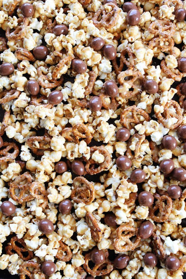 Peanut Butter Pretzel Popcorn Recipe on twopeasandtheirpod.com The perfect party popcorn! Everyone loves this sweet and salty mix! Peanut Butter Pretzel Popcorn Recipe