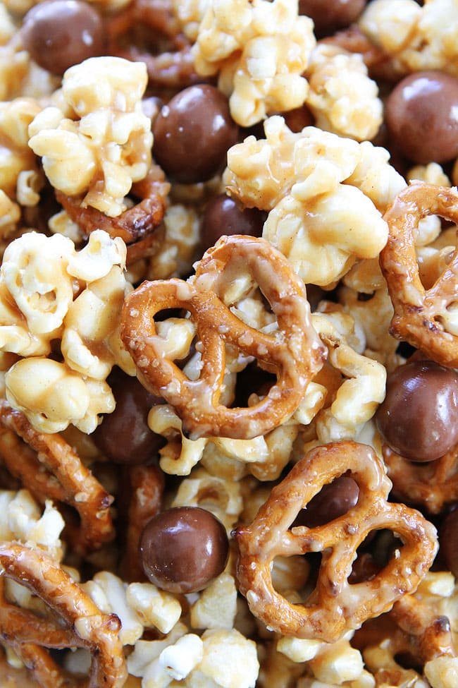 Peanut Butter Pretzel Popcorn Recipe on twopeasandtheirpod.com Love this sweet and salty popcorn! It's perfect for parties or every day snacking! Peanut Butter Pretzel Popcorn Recipe
