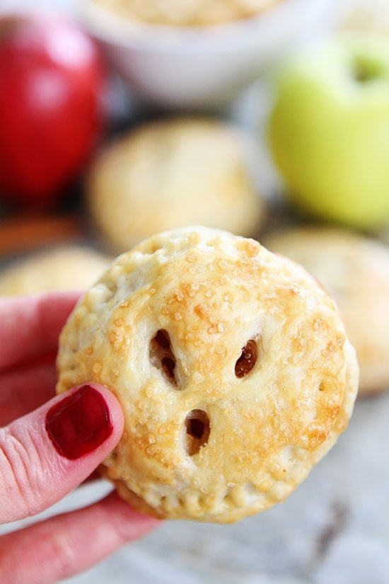 Apple Hand Pies Recipe on twopeasandtheirpod.com Love these mini apple pies! They are such a fun dessert! Apple Hand Pies Recipe
