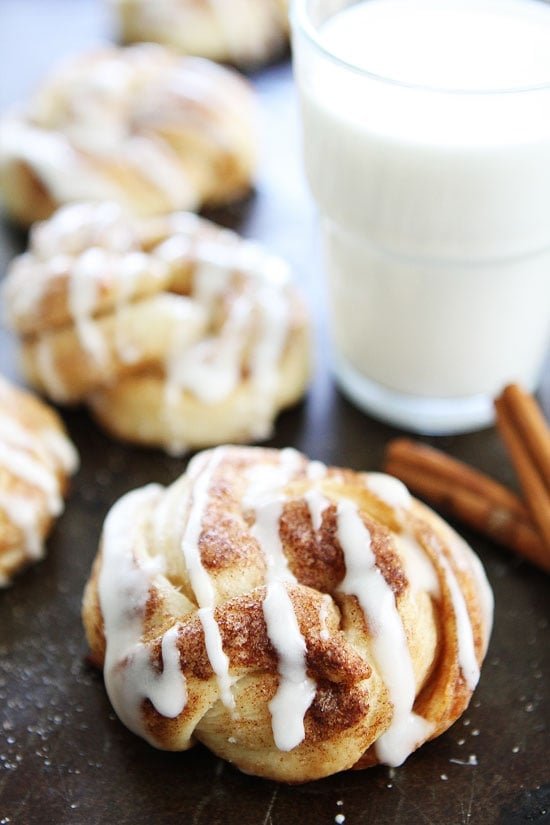Easy Cinnamon Roll Knots Recipe on twopeasandtheirpod.com These quick and easy cinnamon roll knots are drizzled with a sweet cream cheese glaze! They are amazing! Easy Cinnamon Roll Knots Recipe