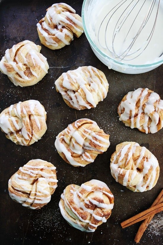 Easy Cinnamon Roll Knots Recipe on twopeasandtheirpod.com These quick and easy cinnamon roll knots are made with pizza dough and taste just like cinnamon rolls. Easy Cinnamon Roll Knots Recipe