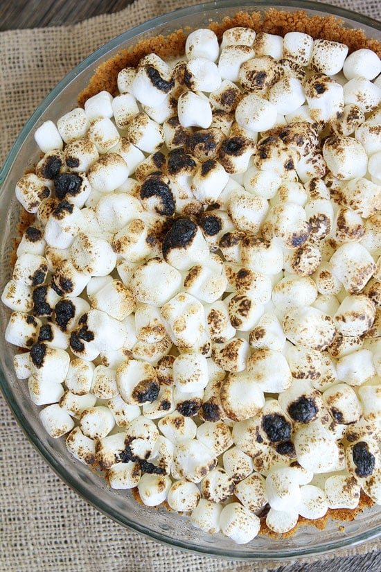 S'mores Ice Cream Pie Recipe on twopeasandtheirpod.com This is the BEST S'mores dessert! A MUST make for summertime! S'mores Ice Cream Pie Recipe