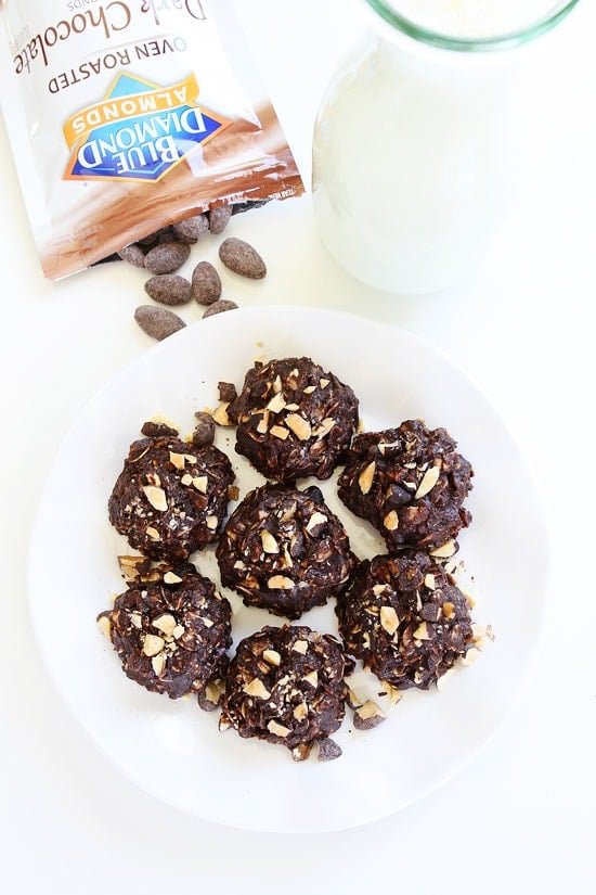 Vegan No-Bake Dark Chocolate Almond Cookie Recipe on twopeasandtheirpod.com These easy no-bake cookies are rich, fudgy, and the perfect summer treat! Vegan No-Bake Dark Chocolate Almond Cookie Recipe