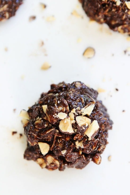 No-Bake Dark Chocolate Almond Cookie Recipe on twopeasandtheirpod.com These easy and healthy no-bake cookies are SO good and they only take 15 minutes to make! No-Bake Dark Chocolate Almond Cookie Recipe